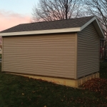 Vinyl siding and aluminum soffit to match the house